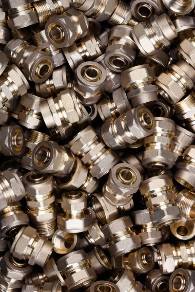 Pex boru bağlantı parçaları. Dokulu arka plan görüntüsü.