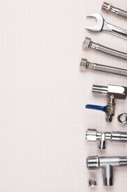 Sıhhi tesisat malzemeleri grafik kağıdı üzerine. 