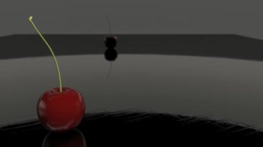 Karanlık bir arka plan üzerinde iplik kiraz. Ağır çekim