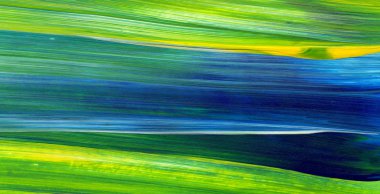 Soyut akrilik resim arka plan, doku, tasarım öğesi olarak kullanmak için. Modern sanat karışık renkler yeşil, mavi, sarı.