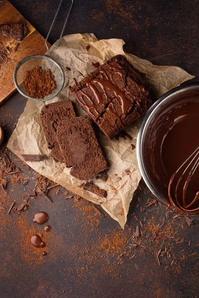 Homemade chocolate cake and cream with whisk — Stock Photo, Image