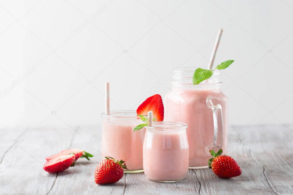 Detox diet concept: strawberry smoothie on table