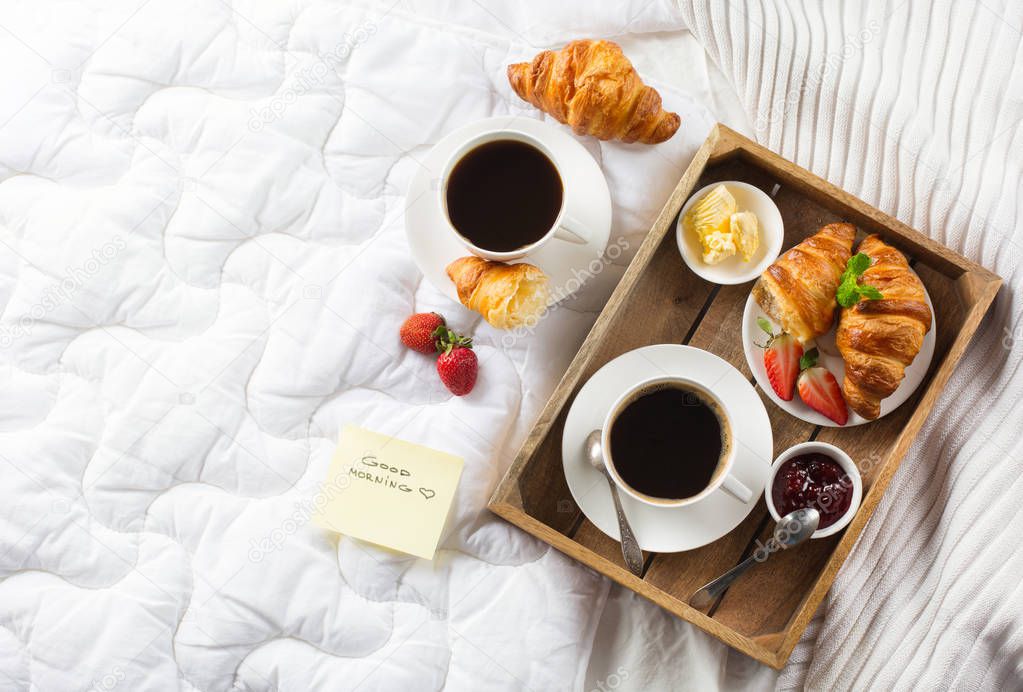 Morning breakfast in bed with coffee