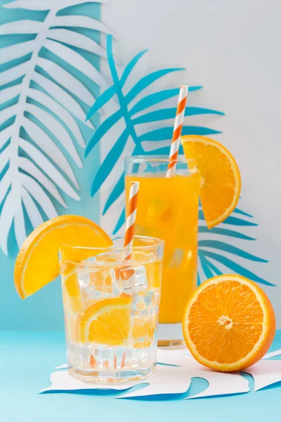 Orange juice in glass and fresh fruits — Stock Photo, Image