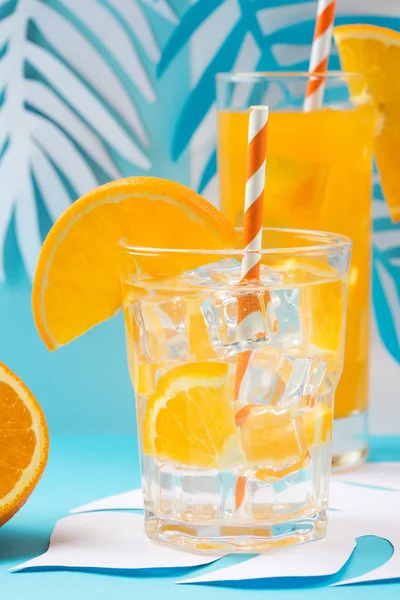 Orange juice in glass and fresh fruits — Stock Photo, Image