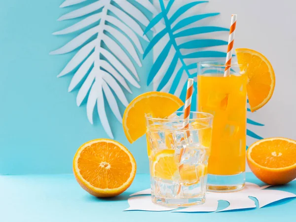 Orange juice in glass and fresh fruits — Stock Photo, Image