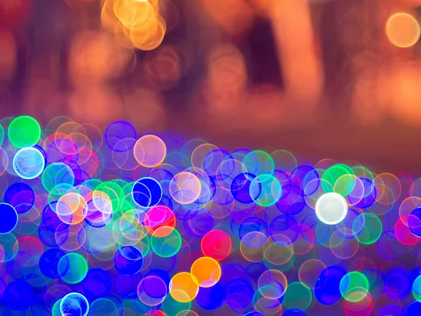 Colorful bokeh a defocus of light at night. — Stock Photo, Image