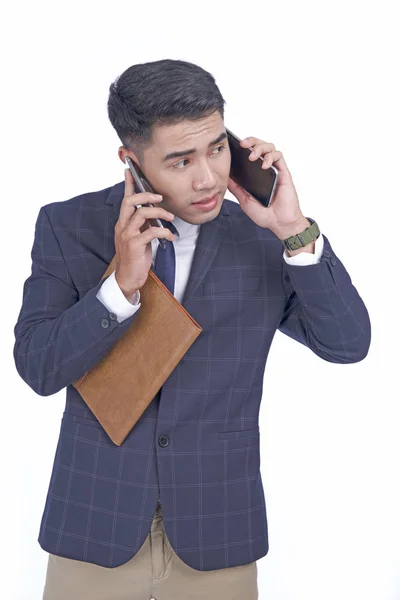 Asian young attractive handsome busy business man with smart phone, wear suit, isolated on white background — Stock Photo, Image