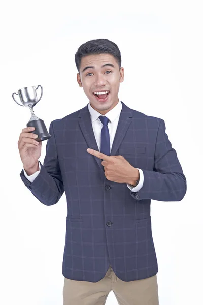 Asian young attractive handsome business man with silver cup, in winning concept, isolated on white background — Stock Photo, Image