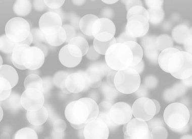 Soyut beyaz Bokeh. Gri arkaplanda bulanık daire ışığı.