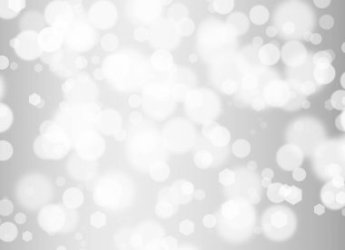 Soyut beyaz Bokeh. Gri arkaplanda bulanık daire ışığı.