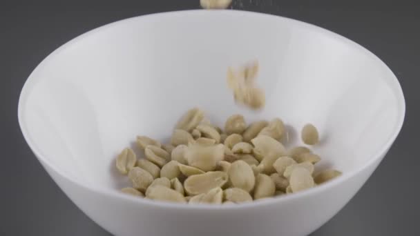 Peanuts Slowly Starting Falling — Stock Video