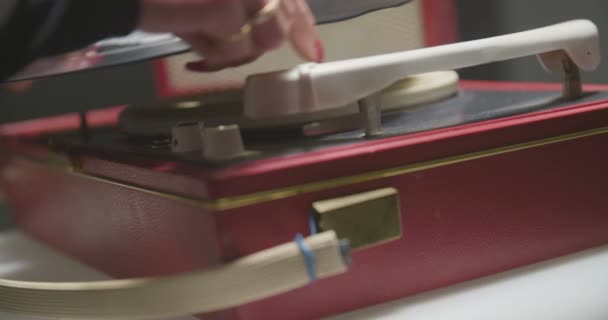 Woman Puts Record Red Gramophone — Stock Video