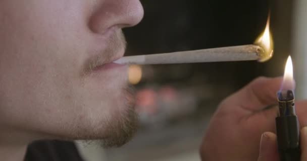 Man Lighting Cannabis Spliff Joint — Stock Video