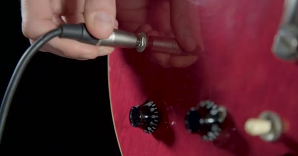 Hand Plugs Jack Cable Guitar Turn Volume Buttons — Stock Video