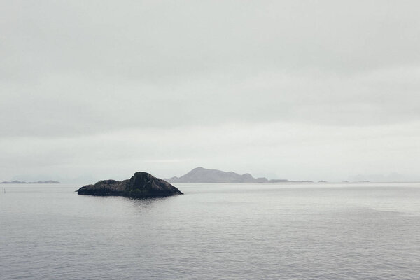 North sea with cold and snow view of the horizon and rocky coast
