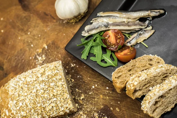 Plate Anchovies Tomatoes Homemade Bread — Stock Photo, Image