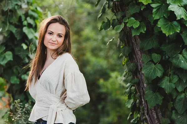 Pretty young girl without posing naturally in nature