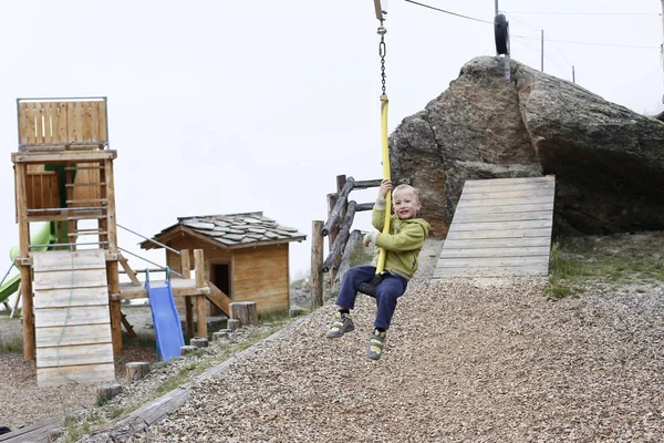 Boy Jumping Zip Line Natural Amusement Park Surrounded Wood Mountains — Stock Photo, Image