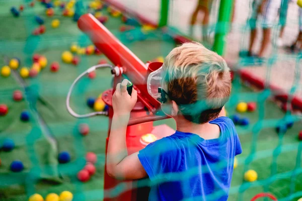 Child Playing Summer Fair Cannon Colored Balls Compressed Air — Stock Photo, Image