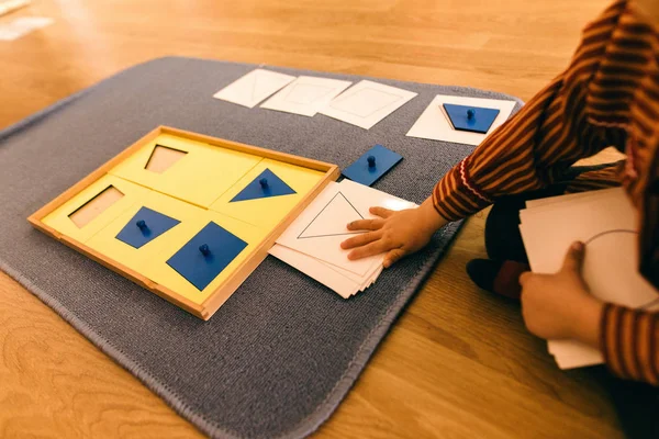 Learning materials in a montessori methodology school being manipulated by children