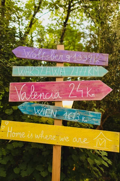 Wooden signposts at events and weddings