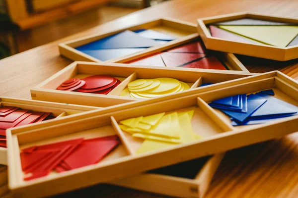 Geometric material in Montessori classroom for the learning of children in mathematics area.