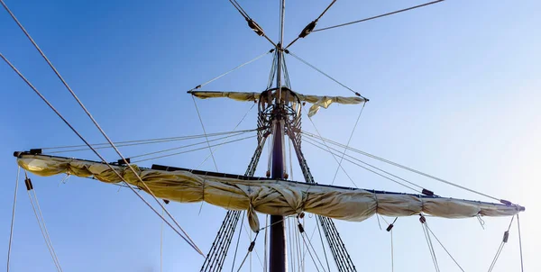 Sails and ropes of the main mast of a caravel ship Santa Mara Columbus ships