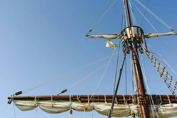 Sails and ropes of the main mast of a caravel ship Santa Mara Columbus ships