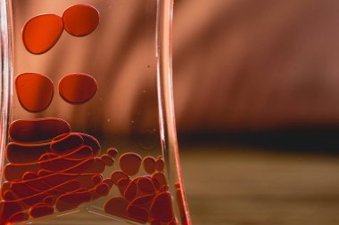 Kırmızı benzer suya düşen kan damlaları.