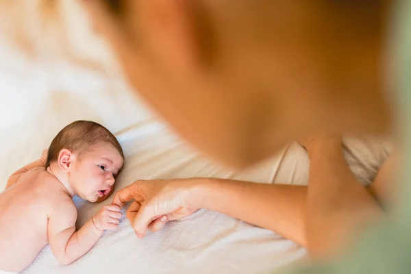 Newborn Baby Holding His Mother Hands Tenderly — Stock Photo, Image