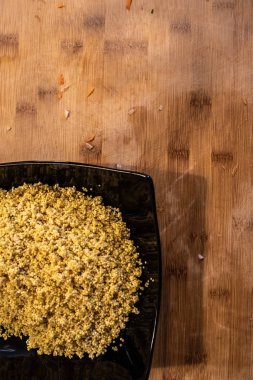 Plaka iliklerine Darı tohumları ile.