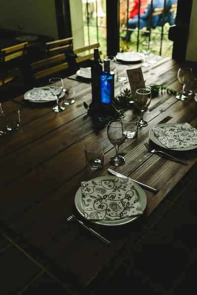 Wooden Tables Cutlery Plates Backlit Glasses Anyone — Stock Photo, Image