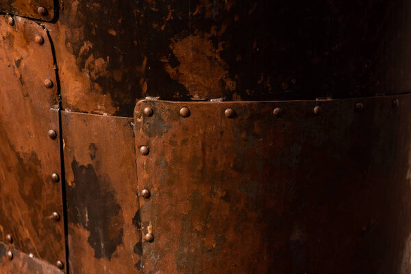 Rusted steel plates joined with rivets