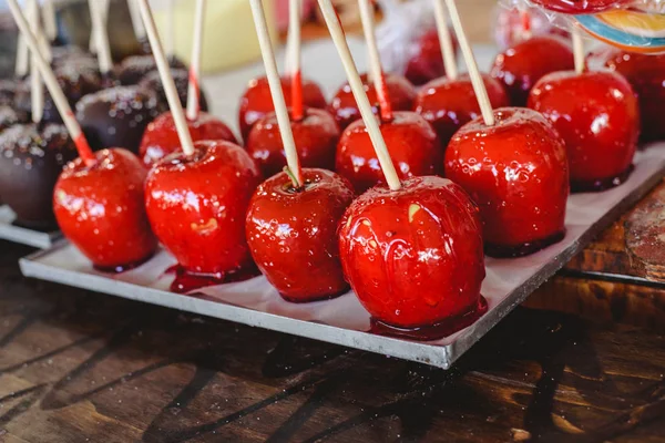 candy apple coated with red caramel candy for sale for kids.