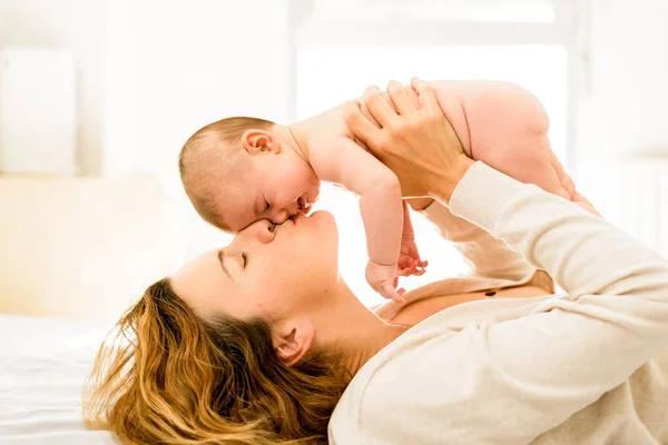 Mom Kissing Her Newly Born Daughter Lovingly Concept Motherhood Happy — Stock Photo, Image