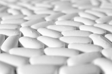 Birçok beyaz hap, ilaç kavramı makro yakın çekim