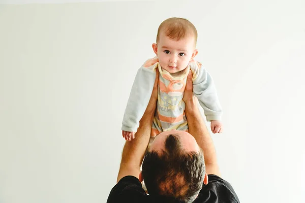 Baby raised by his father — Stock Photo, Image