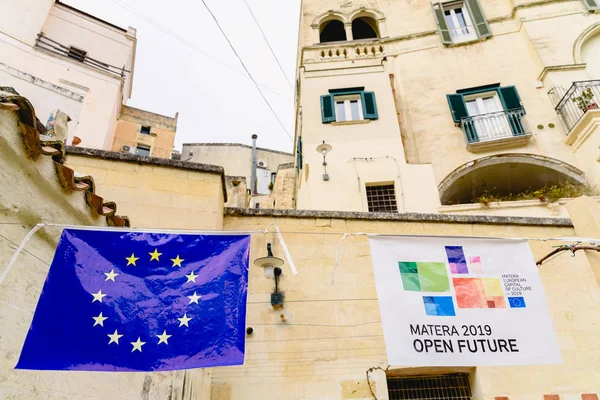 Matera, Italy - March 11, 2019: Flags of Europe in the tourist c — Stock Photo, Image