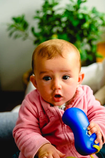 Adorable playful happy baby having fun with a child phone, cheer — Stock Photo, Image