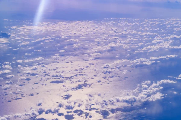 Sea of blue and white clouds seen from above. — Stock Photo, Image