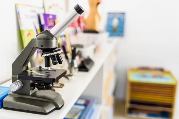 Microscope in a children's classroom. — Stock Photo, Image