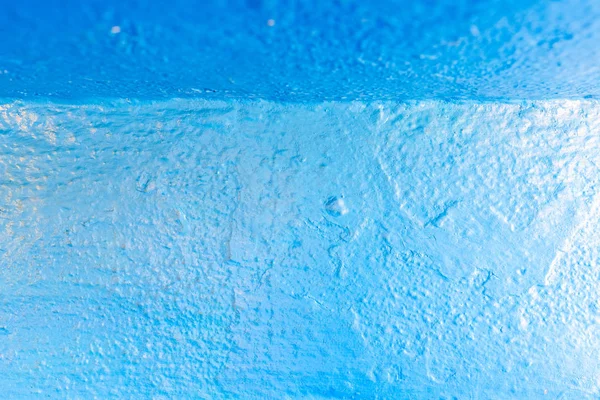 Fundo abstrato de tons azuis, com textura de tinta em um concr — Fotografia de Stock