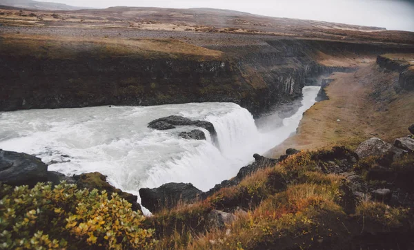 Panoramic photos of famous Icelandic waterfalls on cloudy days w — Stock Photo, Image