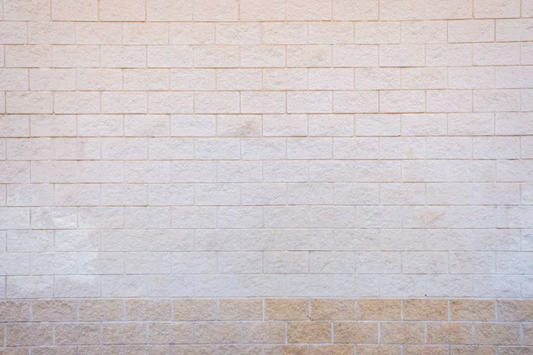 Белая кирпичная стена с грубой текстурой . — стоковое фото