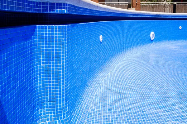 repair and cleaning works of a swimming pool for the summer.