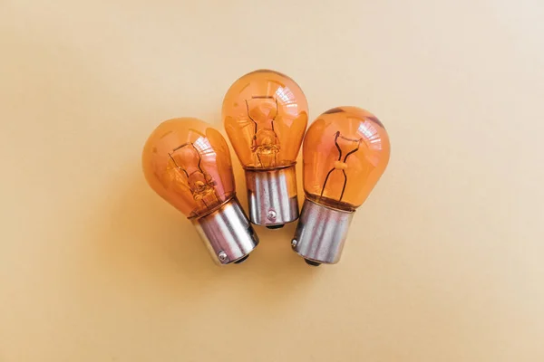 Detail of 12v orange car brake light bulbs