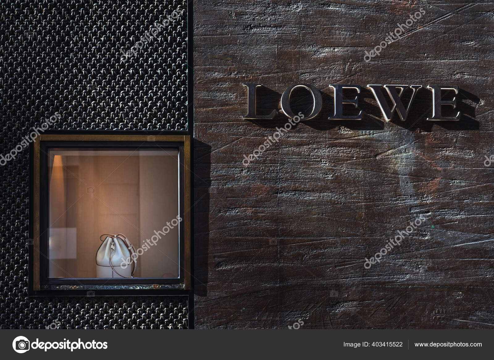 LOEWE fashion brand logo editorial photography. Image of