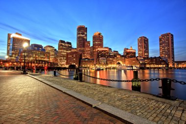 Boston Skyline with Financial District and Boston Harbor at Dusk clipart