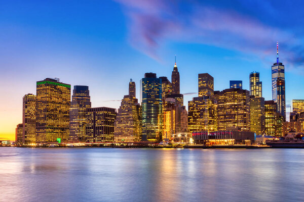 New York City Lower Manhattan with Brooklyn Bridge at Dusk, View from Brooklyn, New York, USA